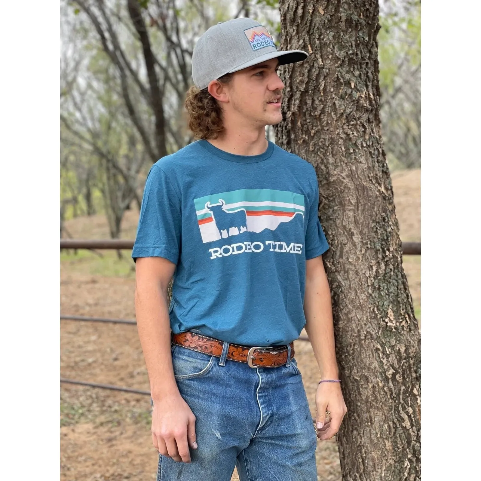 Dale Brisby Unisex T-Shirt Rodeo Time Sunset Teal/Cream T-125