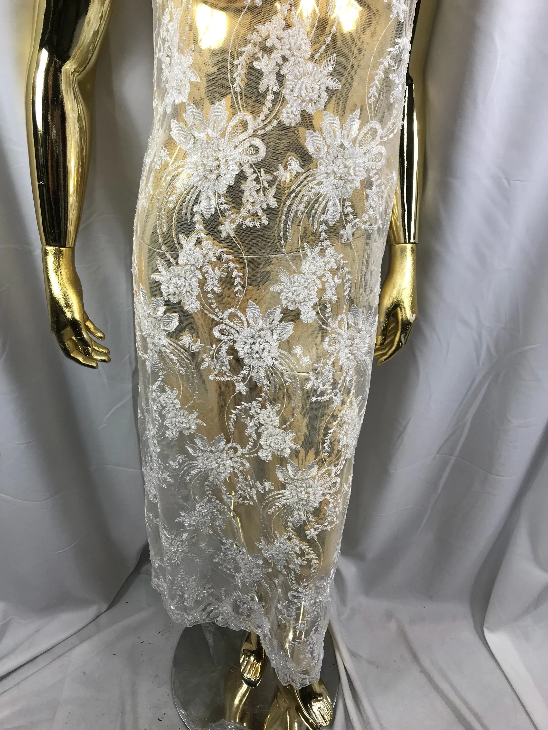 White hand beaded floral design embroider on a mesh lace-dresses-fashion-apparel-nightgown-prom-decorations-sold by the yard.
